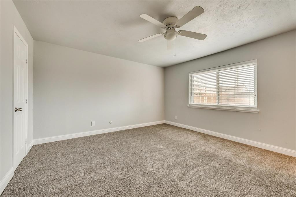 5220 Arbor Glen Road The Colony, TX 75056 - Photo 22 of 29 an empty room with a window