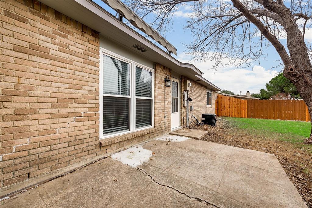 5220 Arbor Glen Road The Colony, TX 75056 - Photo 26 of 29 a view of a house with a yard and garage
