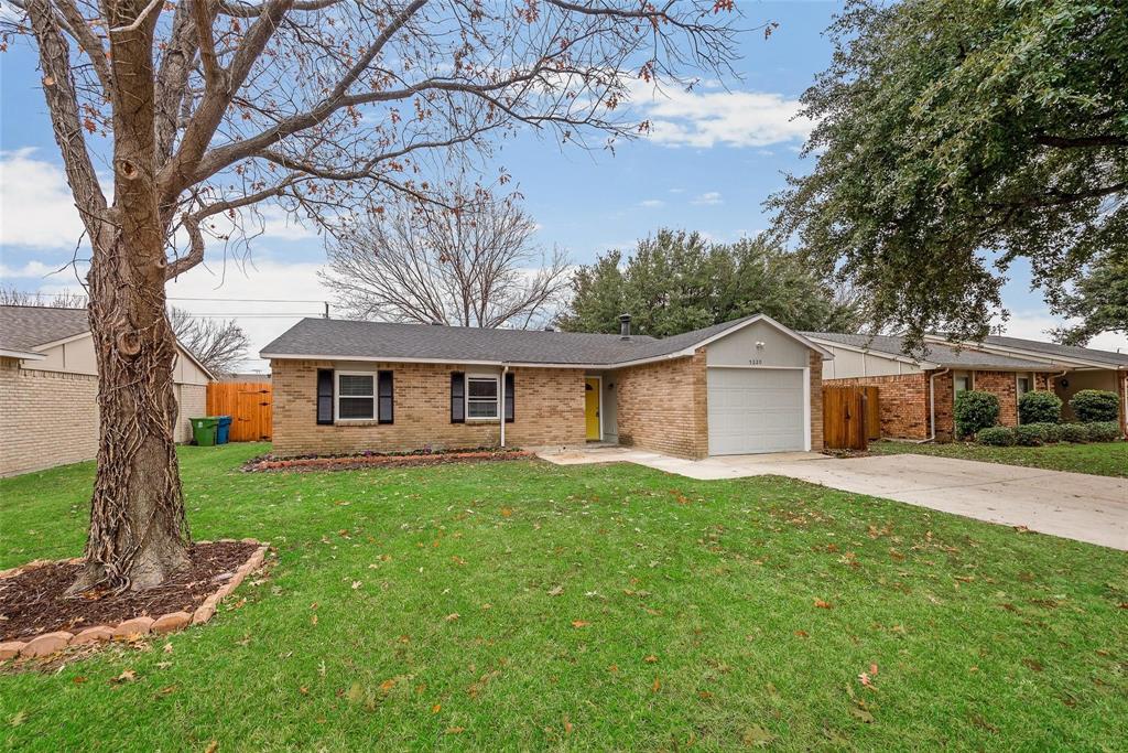 5220 Arbor Glen Road The Colony, TX 75056 - Photo 3 of 29 front view of a house with a yard