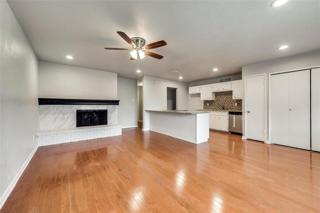5220 Arbor Glen Road The Colony, TX 75056 - Photo 8 of 29 a view of kitchen with microwave and a refrigerator