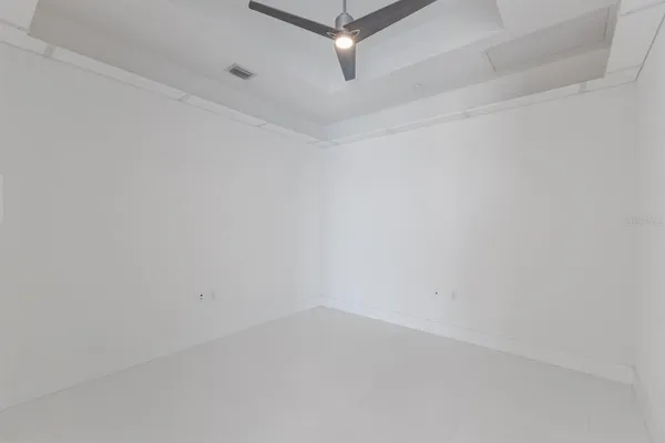 a bathroom with a shower and toilet