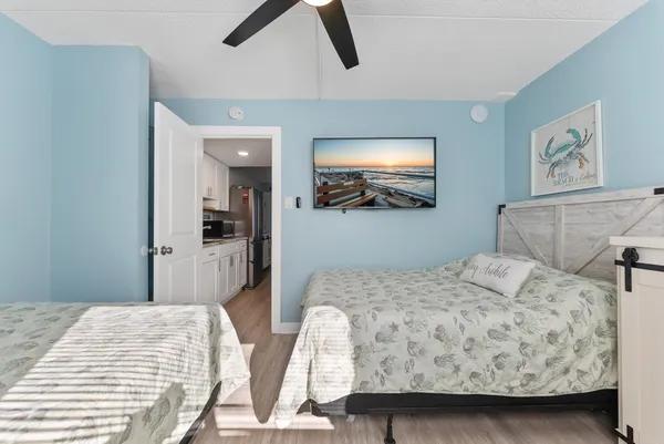 a bedroom with a bed and lamp