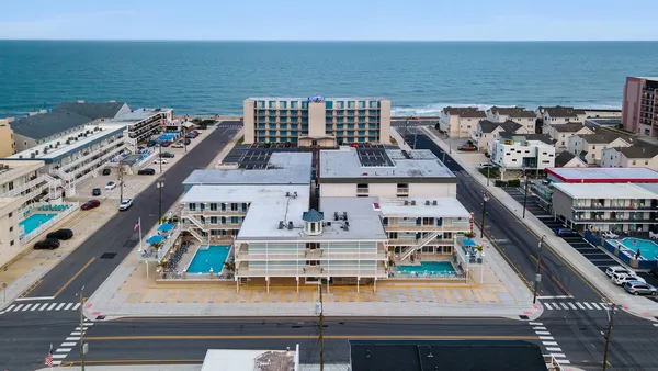 a view of a balcony with an ocean view