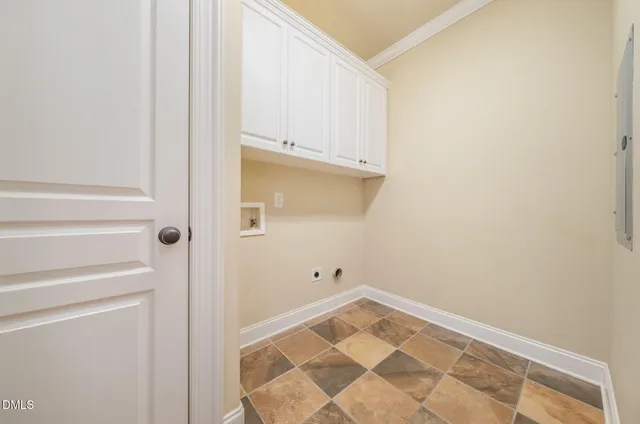 a view of a room with white walls