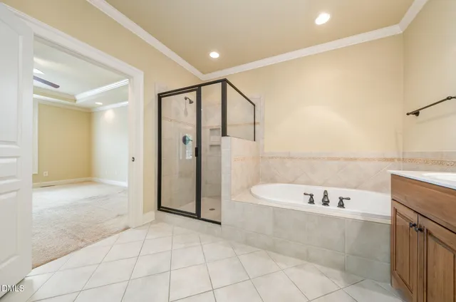 a bathroom with a bathtub and a sink