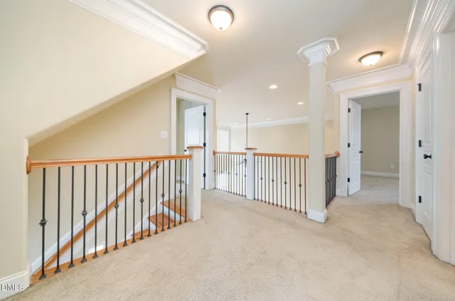 a view of a hallway with closet and entryway
