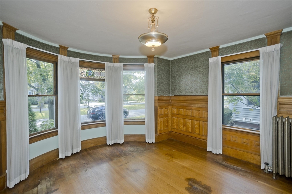 43 Magnolia Terrace Springfield, MA 01108 - Photo 4 of 40 a view of an empty room with a window