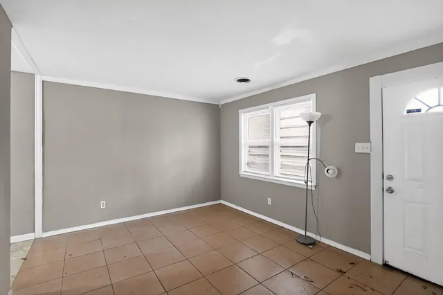 a view of an empty room with window