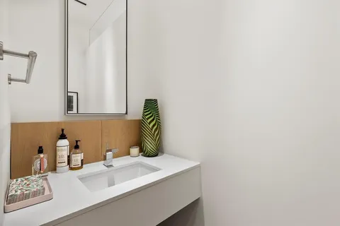 a room with a wooden floor and furniture