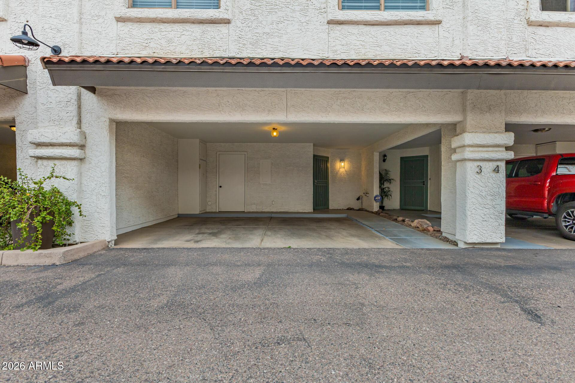 4328 North 36th Street, Unit 3 Phoenix, AZ 85018 - Photo 2 of 28 a view of a livingroom with a staircase