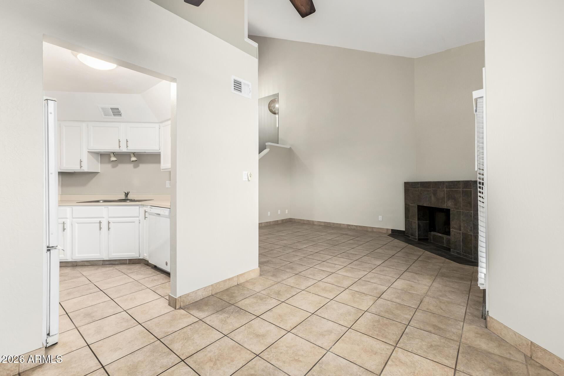 4328 North 36th Street, Unit 3 Phoenix, AZ 85018 - Photo 10 of 28 a view of kitchen and empty room with windows