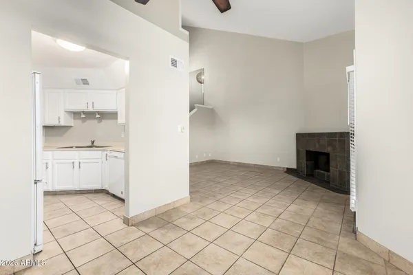 a kitchen with cabinets appliances and a sink
