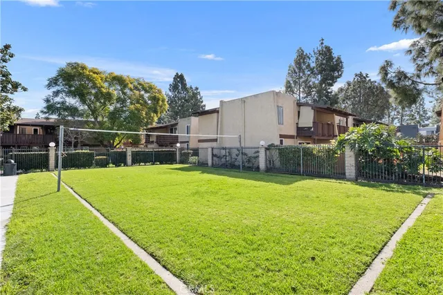 a view of a livingroom with furniture and a window