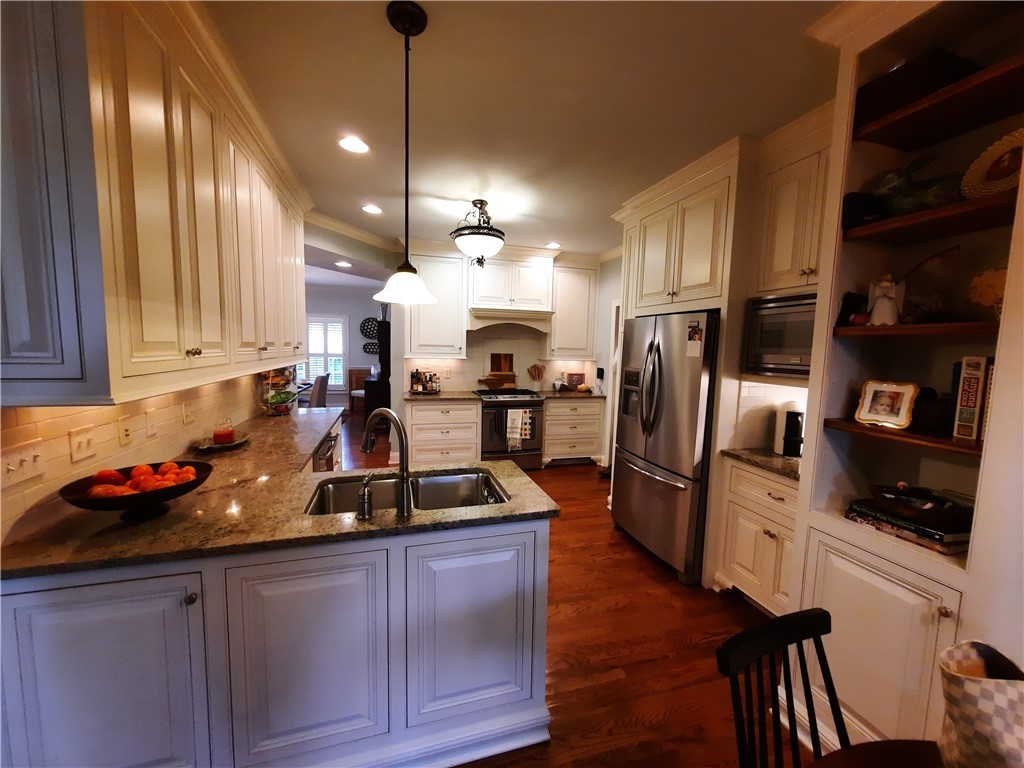 3104 Myrtlewood Anderson, SC 29621 - Photo 14 of 49 Kitchen with Hardwood Floors