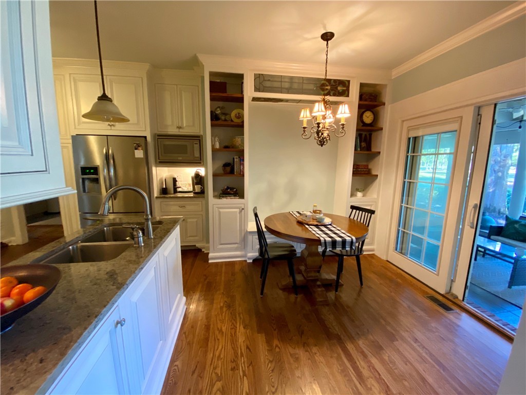 3104 Myrtlewood Anderson, SC 29621 - Photo 17 of 49 Breakfast Area open to the Kitchen and Screened Po