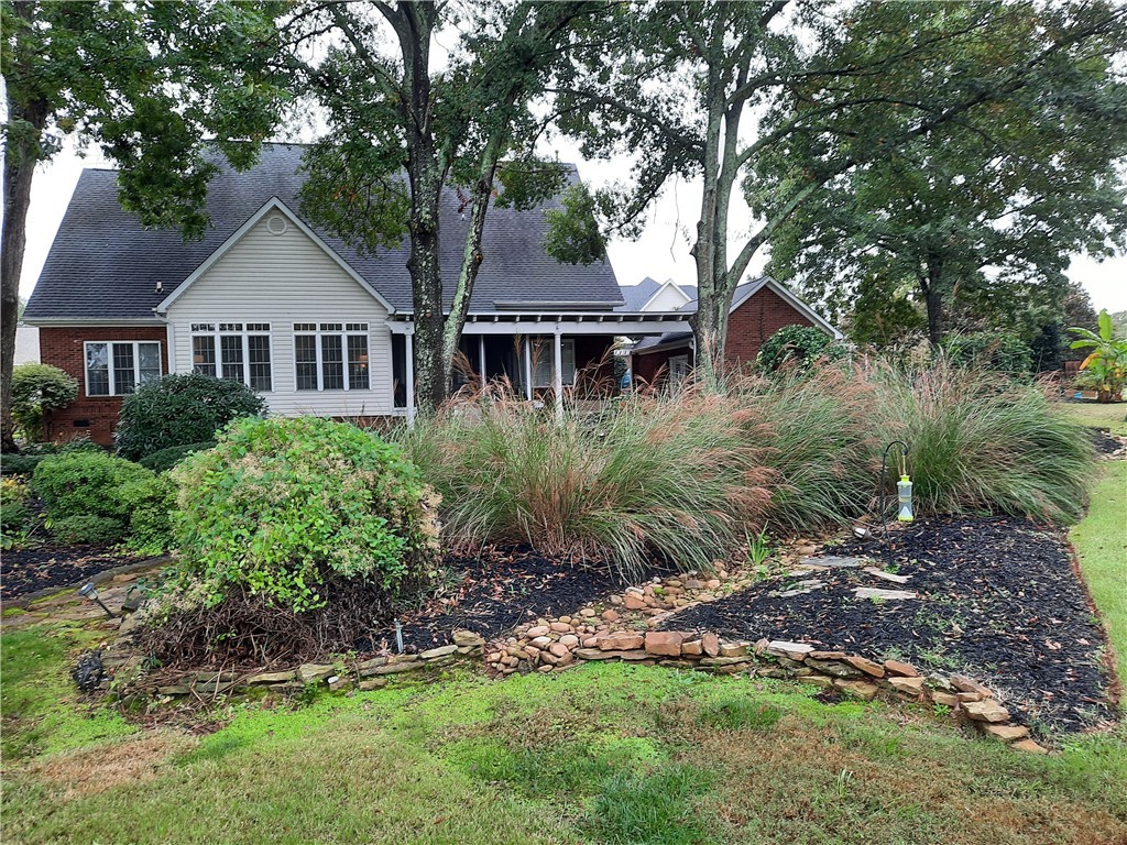 3104 Myrtlewood Anderson, SC 29621 - Photo 43 of 49 Rear View with Beautiful Gardens