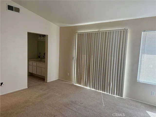 a view of a livingroom with a staircase