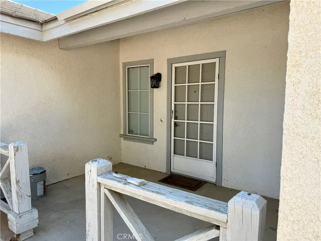 a workspace with furniture and a window