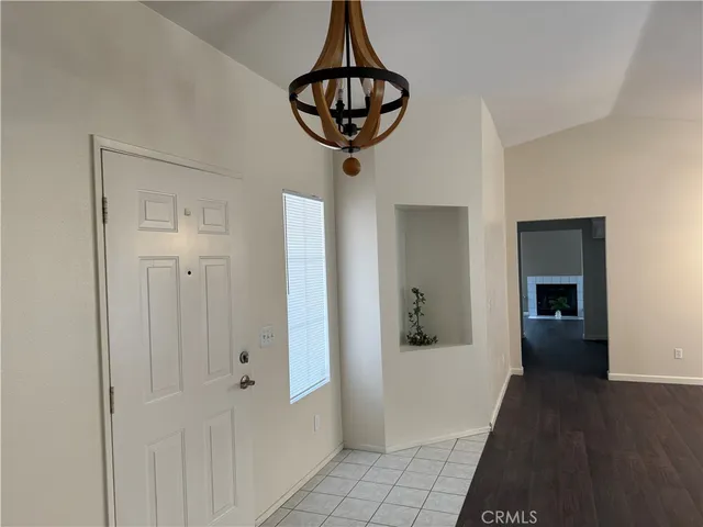 a view of entryway with livingroom