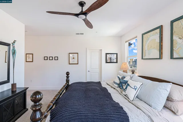 a bed room with a bed and furniture