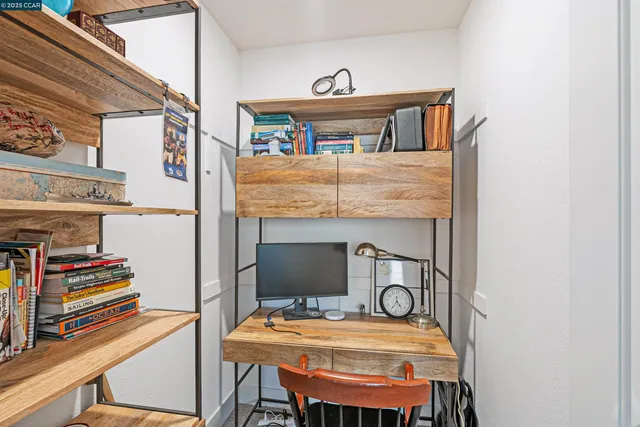 a room with furniture and a book shelf