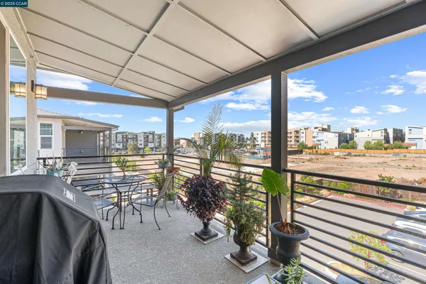 a view of a living room with washer and dryer