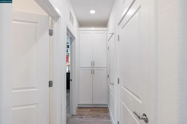 a view of a pathway both side of building