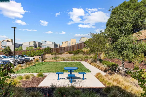 a view of a swimming pool and sitting area