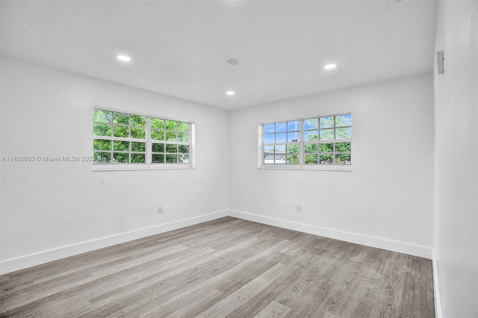 7813 Granada Boulevard Miramar, FL 33023 - Photo 13 of 35 an empty room with windows