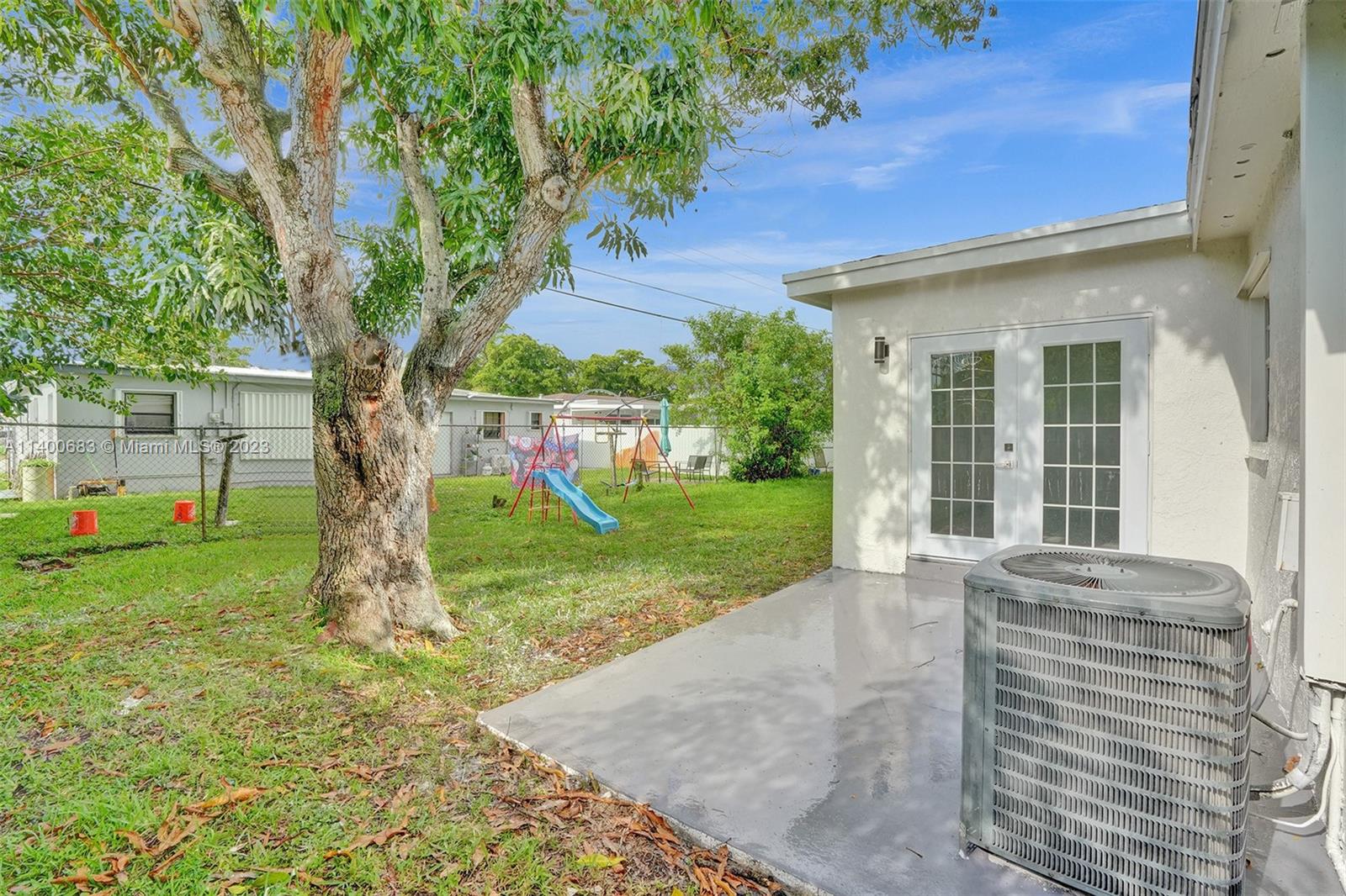 7813 Granada Boulevard Miramar, FL 33023 - Photo 30 of 35 a view of outdoor space yard and porch