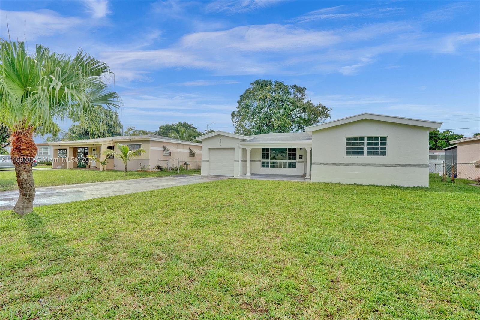 7813 Granada Boulevard Miramar, FL 33023 - Photo 35 of 35 a view of house with outdoor space and deck
