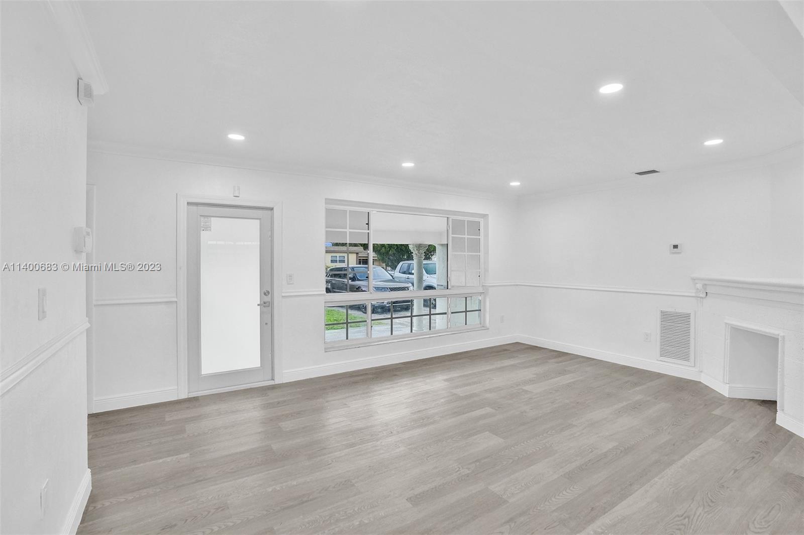 7813 Granada Boulevard Miramar, FL 33023 - Photo 8 of 35 a view of an empty room with a window