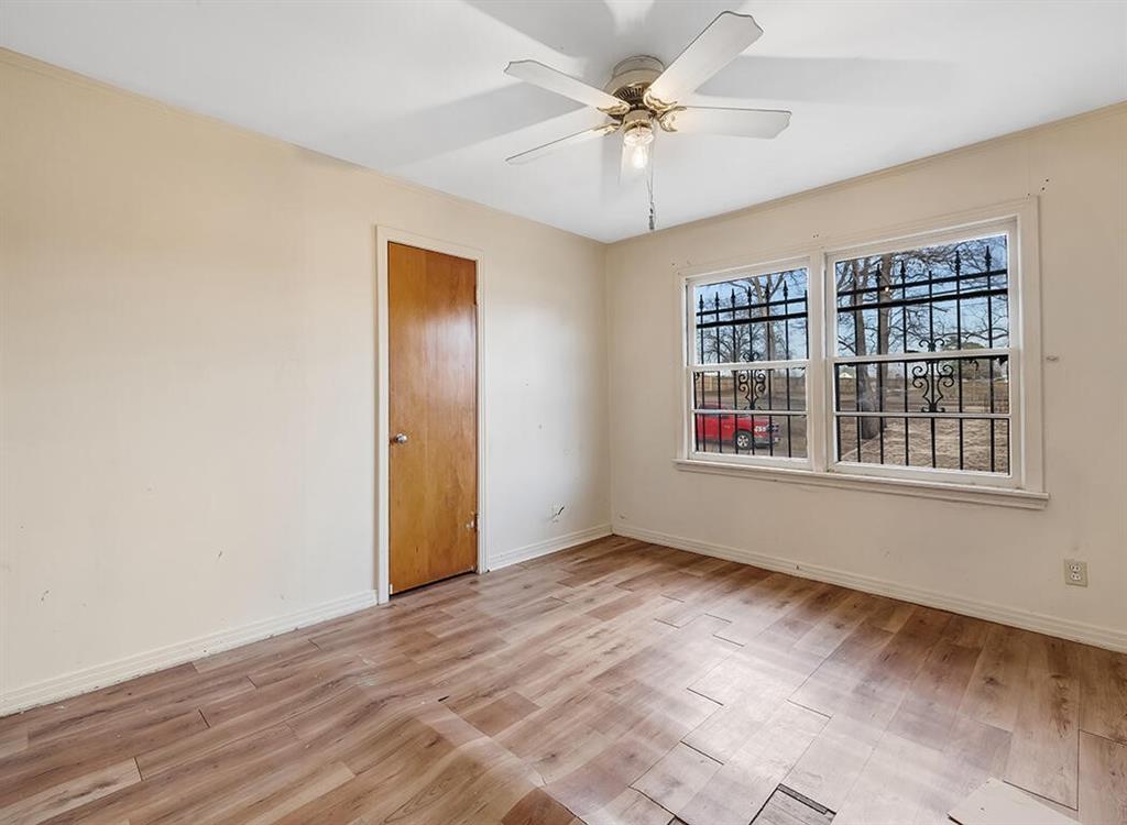 1121 Wheeler Street Texarkana, TX 75503 - Photo 12 of 14 a view of an empty room with a window