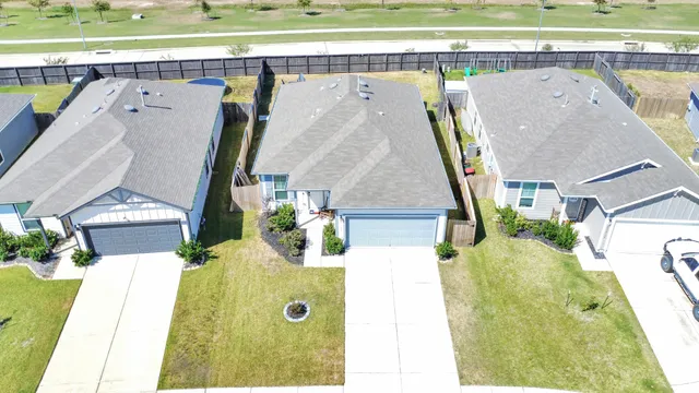 a view of swimming pool with a sink and mirror