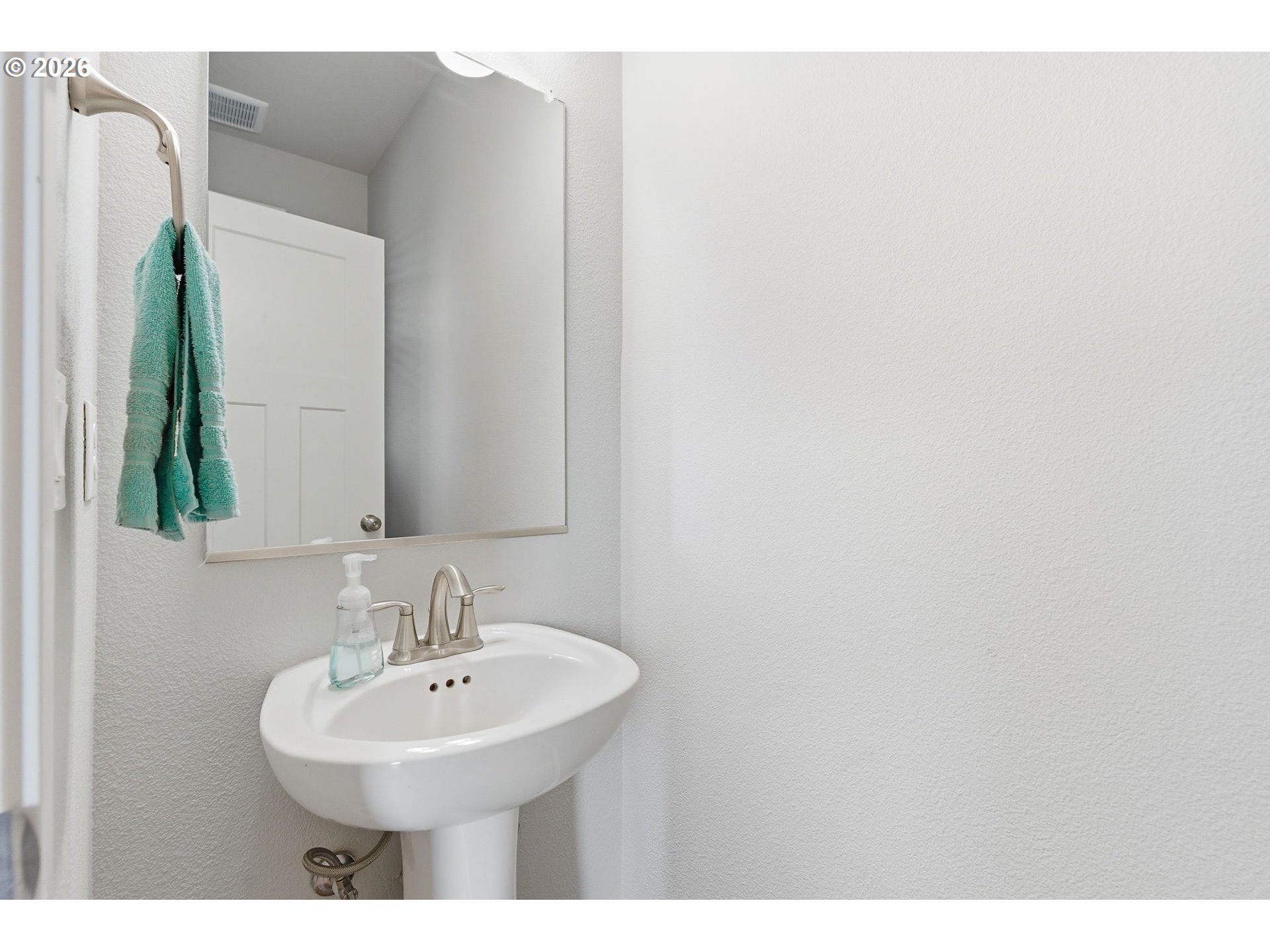 476 Southwest 15th Avenue Canby, OR 97013 - Photo 8 of 41 a bathroom with a sink and a mirror