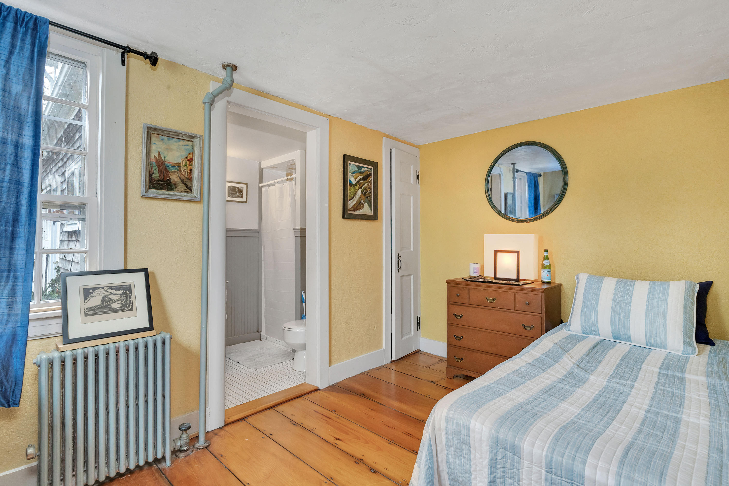 3 Hughes Road Truro, MA 02666 - Photo 12 of 34 a bedroom with a bed and a dresser