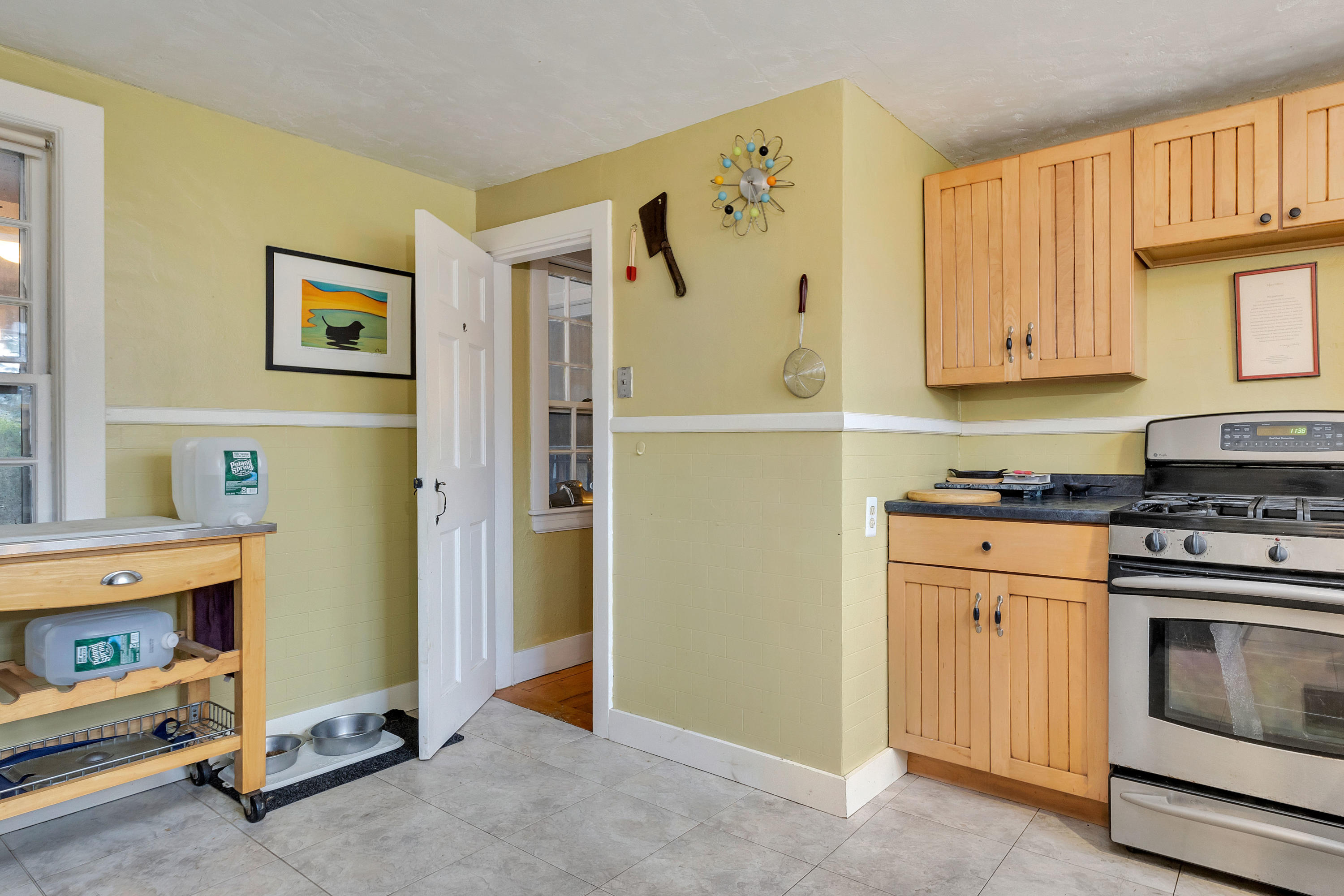 3 Hughes Road Truro, MA 02666 - Photo 3 of 34 a kitchen with a refrigerator and a stove