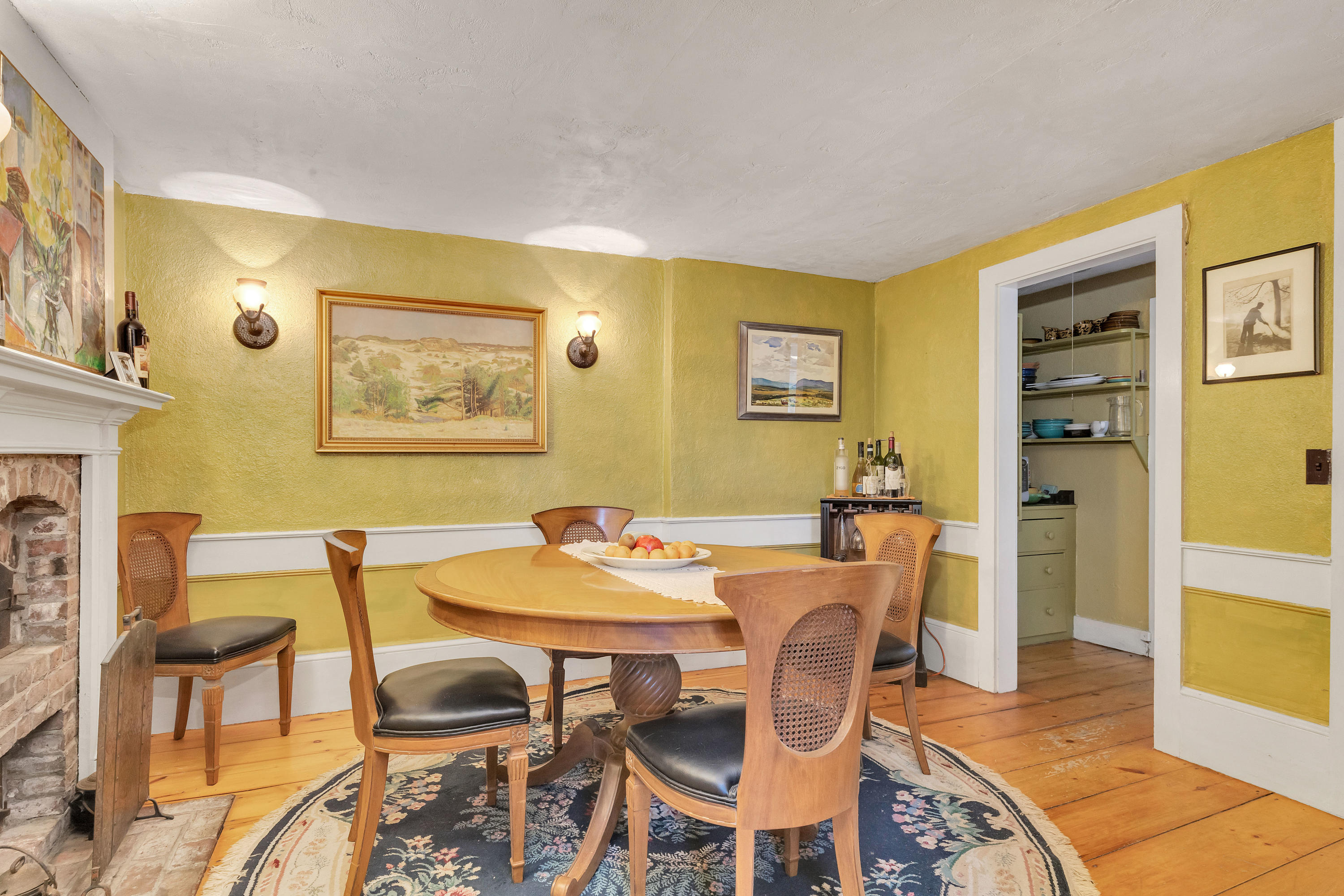 3 Hughes Road Truro, MA 02666 - Photo 7 of 34 a view of a dining room with furniture and a table