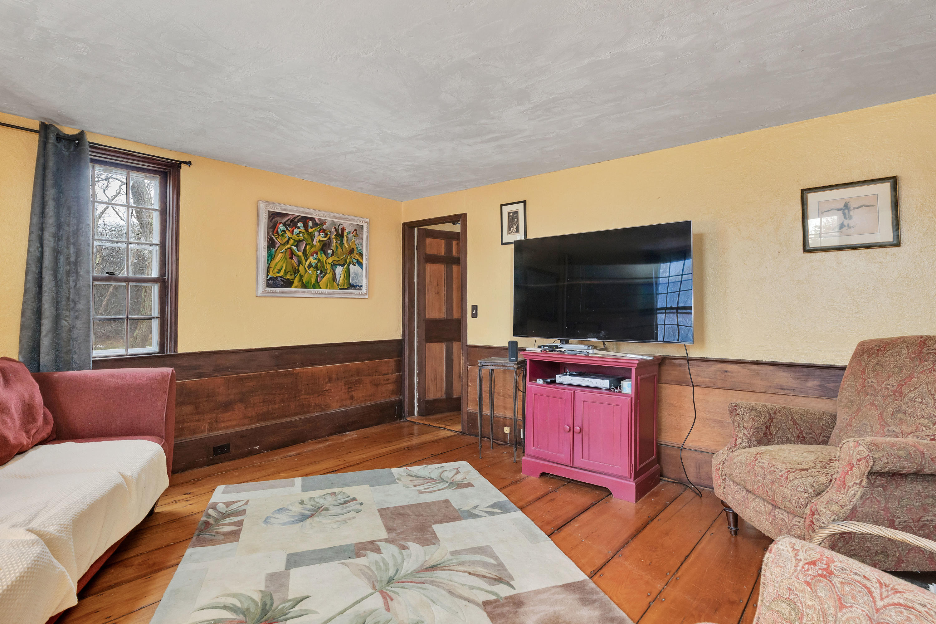 3 Hughes Road Truro, MA 02666 - Photo 10 of 34 a living room with furniture and a flat screen tv