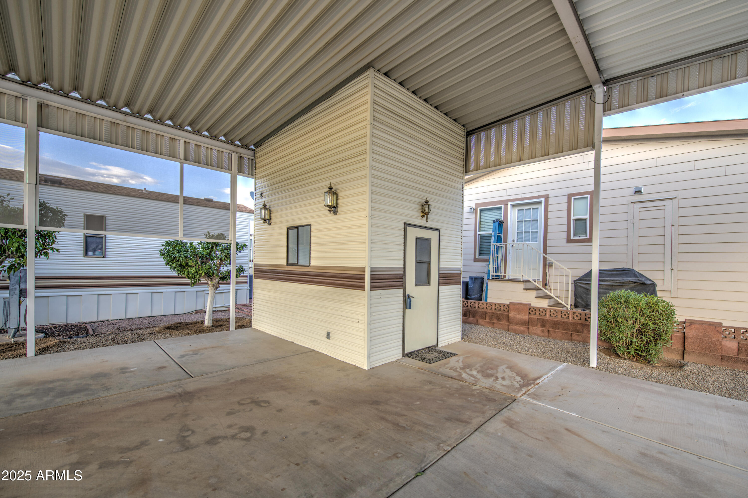 7750 East Broadway Road, Unit 191 Mesa, AZ 85208 - Photo 12 of 23 a view of a porch with seating space