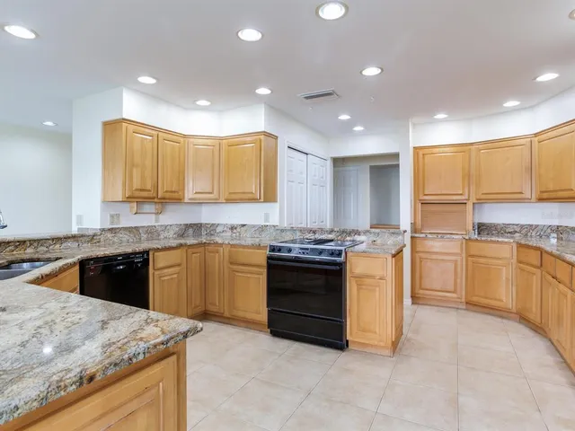 a bathroom with a toilet sink and a mirror