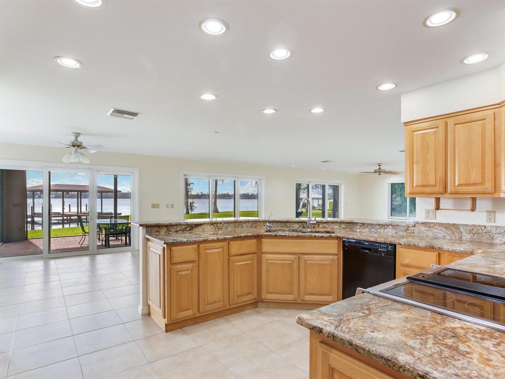 18120 Wayne Road Odessa, FL 33556 - Photo 34 of 100 a kitchen with lots of counter top space and appliances
