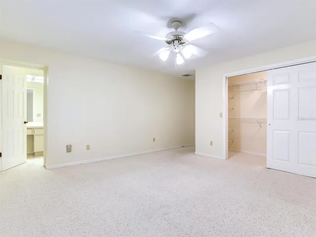 a view of a house with yard and tree s