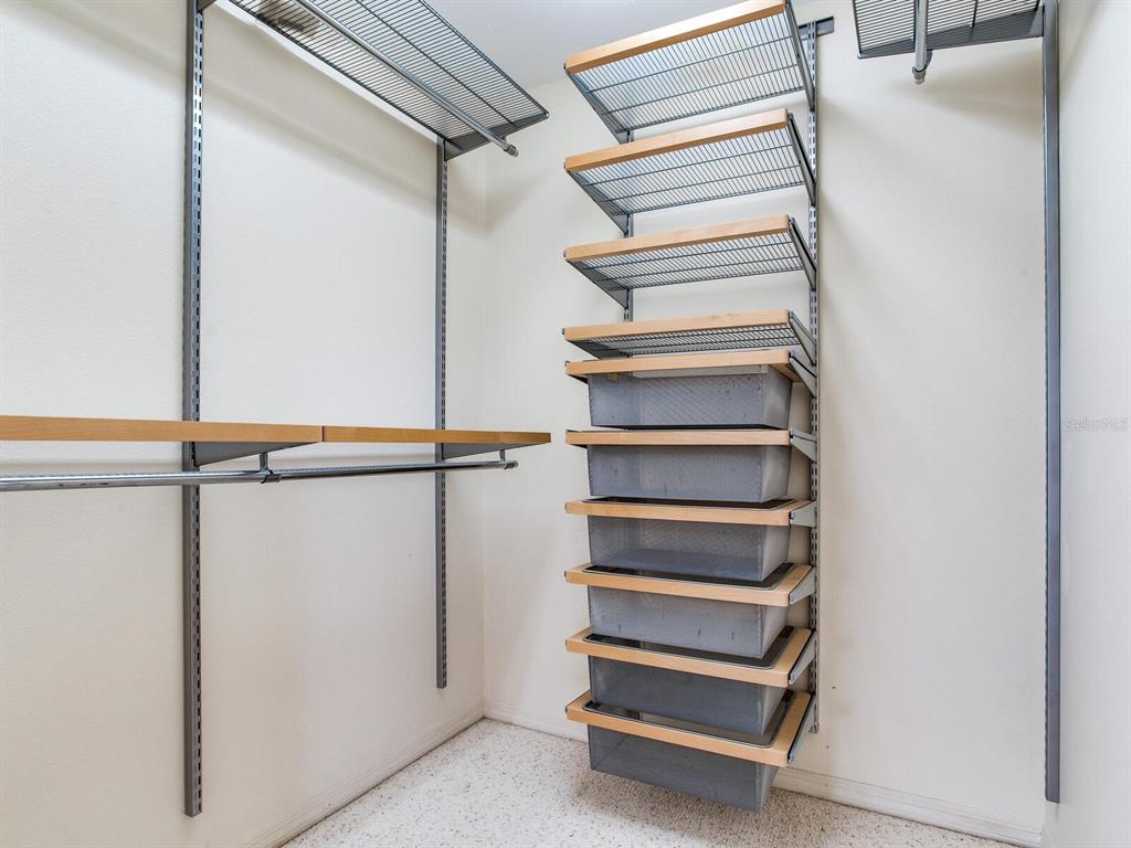 18120 Wayne Road Odessa, FL 33556 - Photo 59 of 100 a view of walk in closet with empty racks