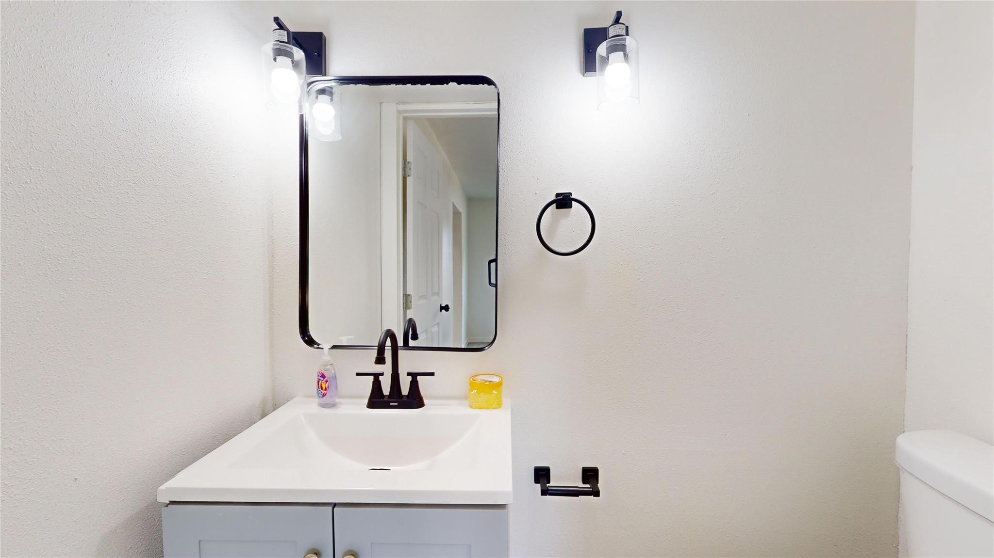 3806 Cosby Street Houston, TX 77021 - Photo 12 of 48 a bathroom with a sink and a mirror