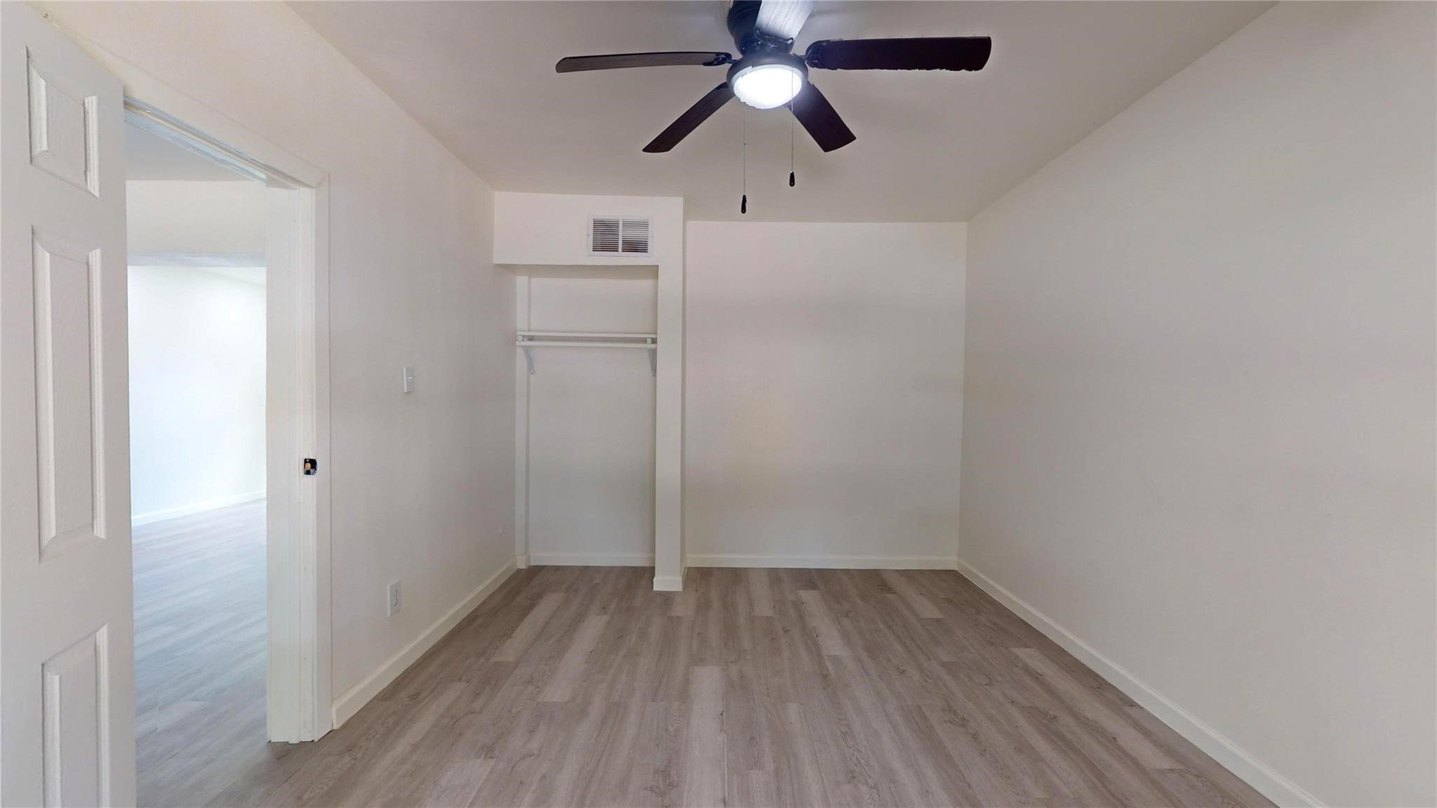 3806 Cosby Street Houston, TX 77021 - Photo 19 of 48 a view of empty room with wooden floor