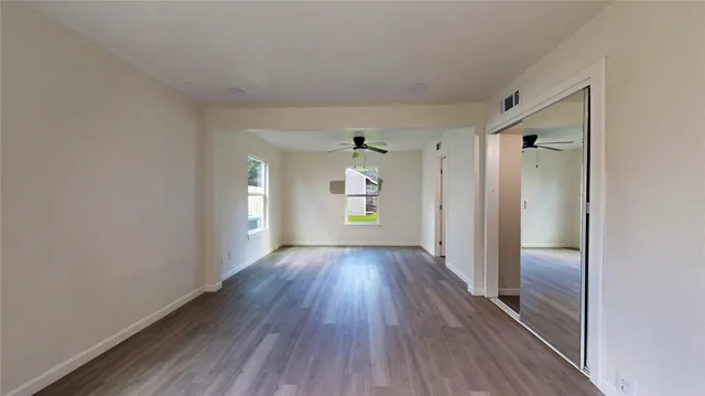 a view of an empty room and window