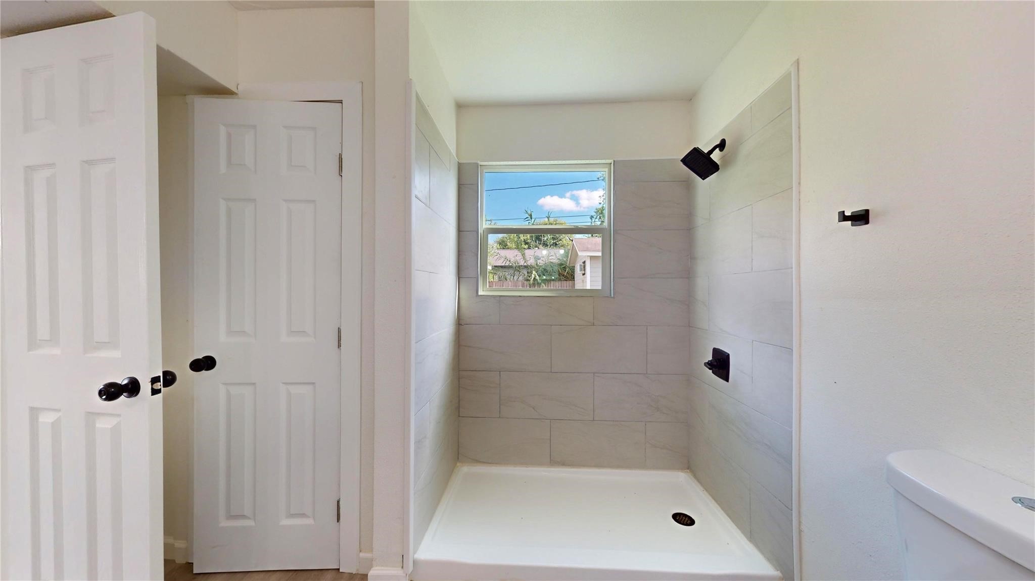 3806 Cosby Street Houston, TX 77021 - Photo 27 of 48 a bathroom with a shower
