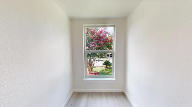 an empty room with window