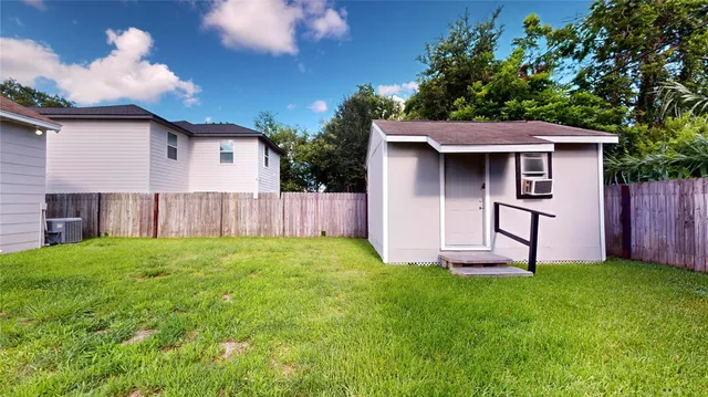 a view of a backyard with a garden